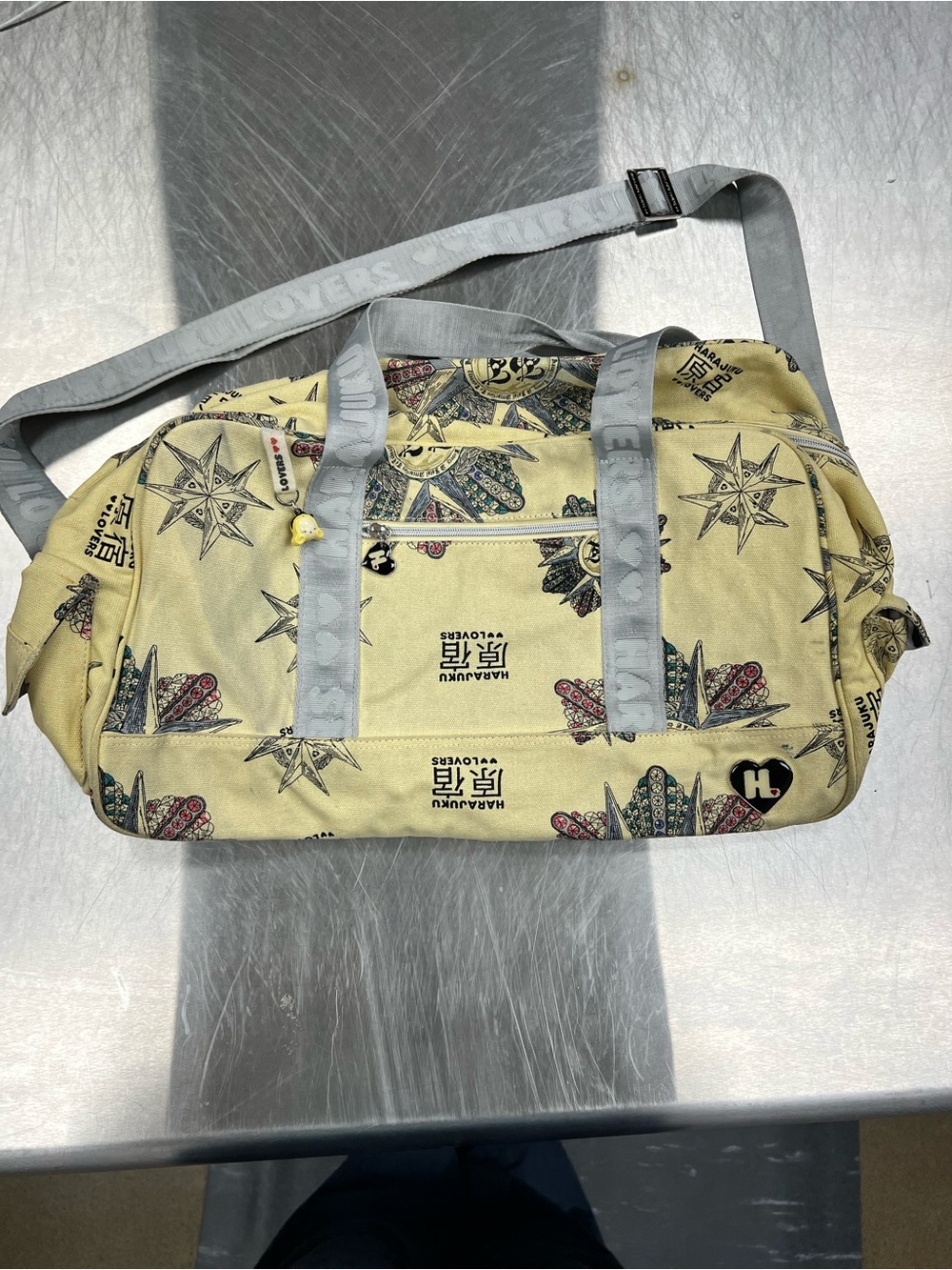 Harajuku Lovers Yellow Patterned Travel Duffel with Gray Straps